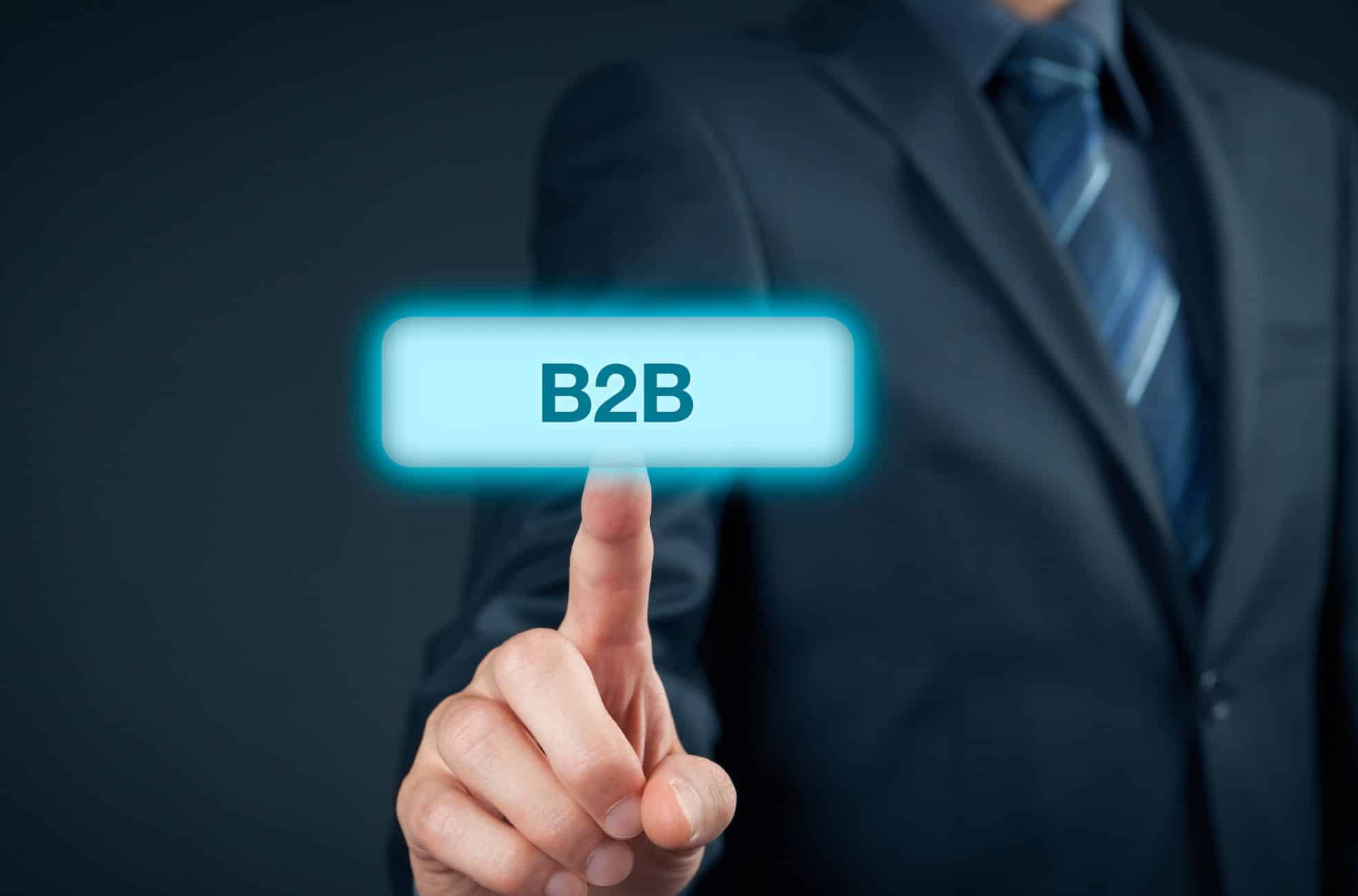 Businessman Pointing To B2B Symbol