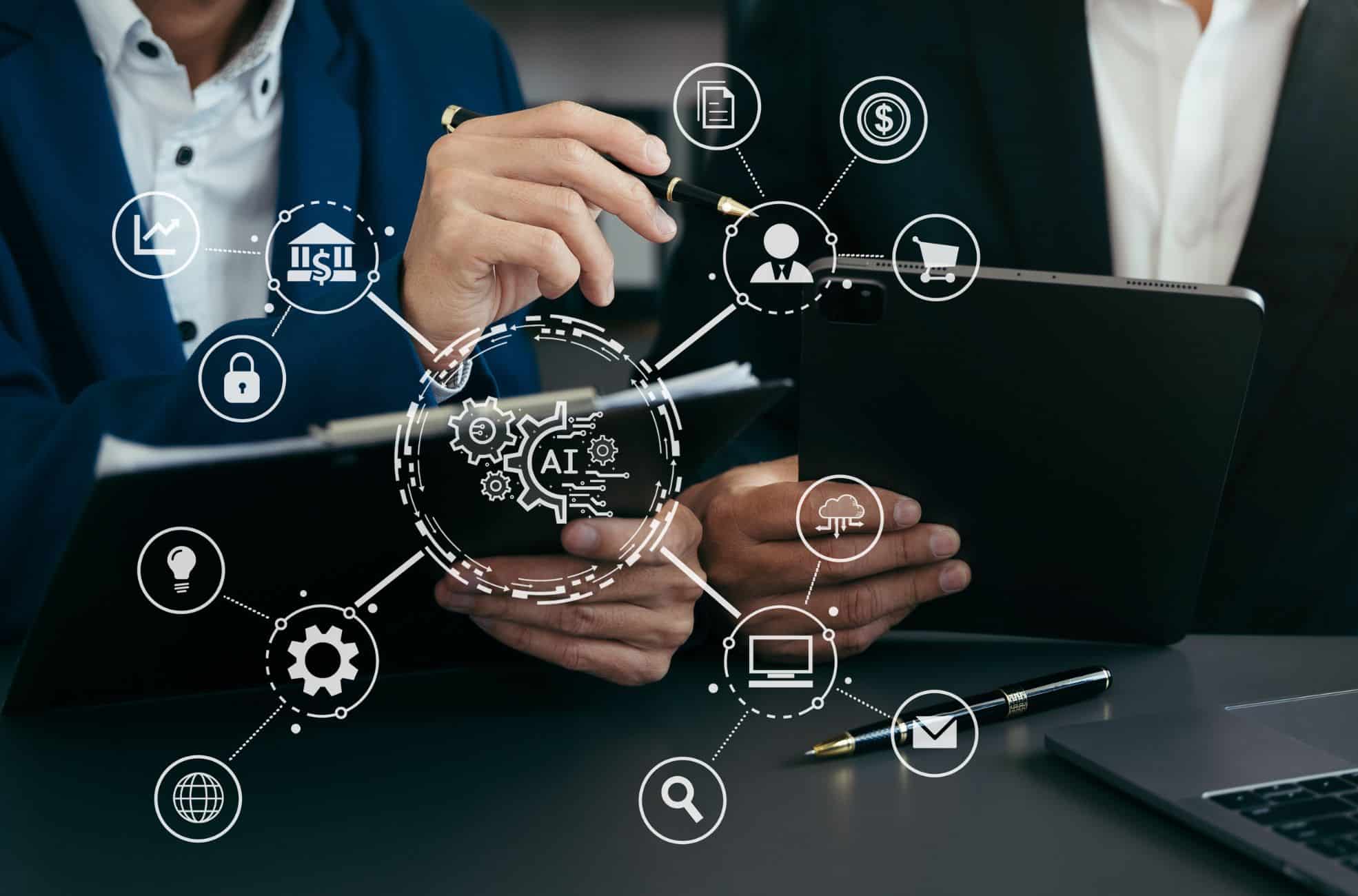 Two Business Men Looking Online With Laptops