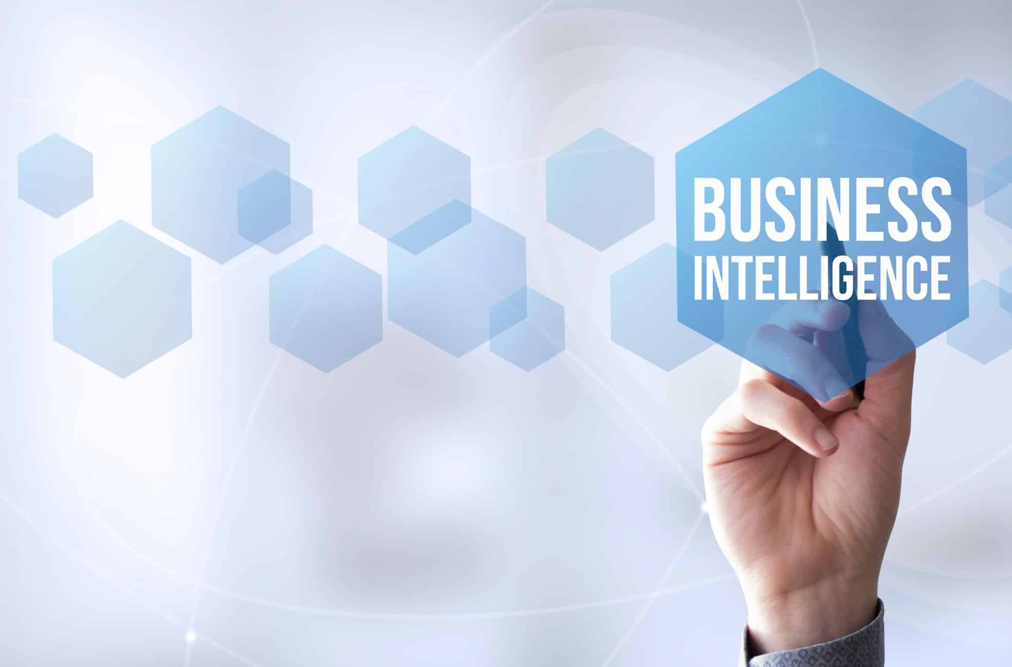 Hand Pointing To Sign Saying "Business Intelligence"
