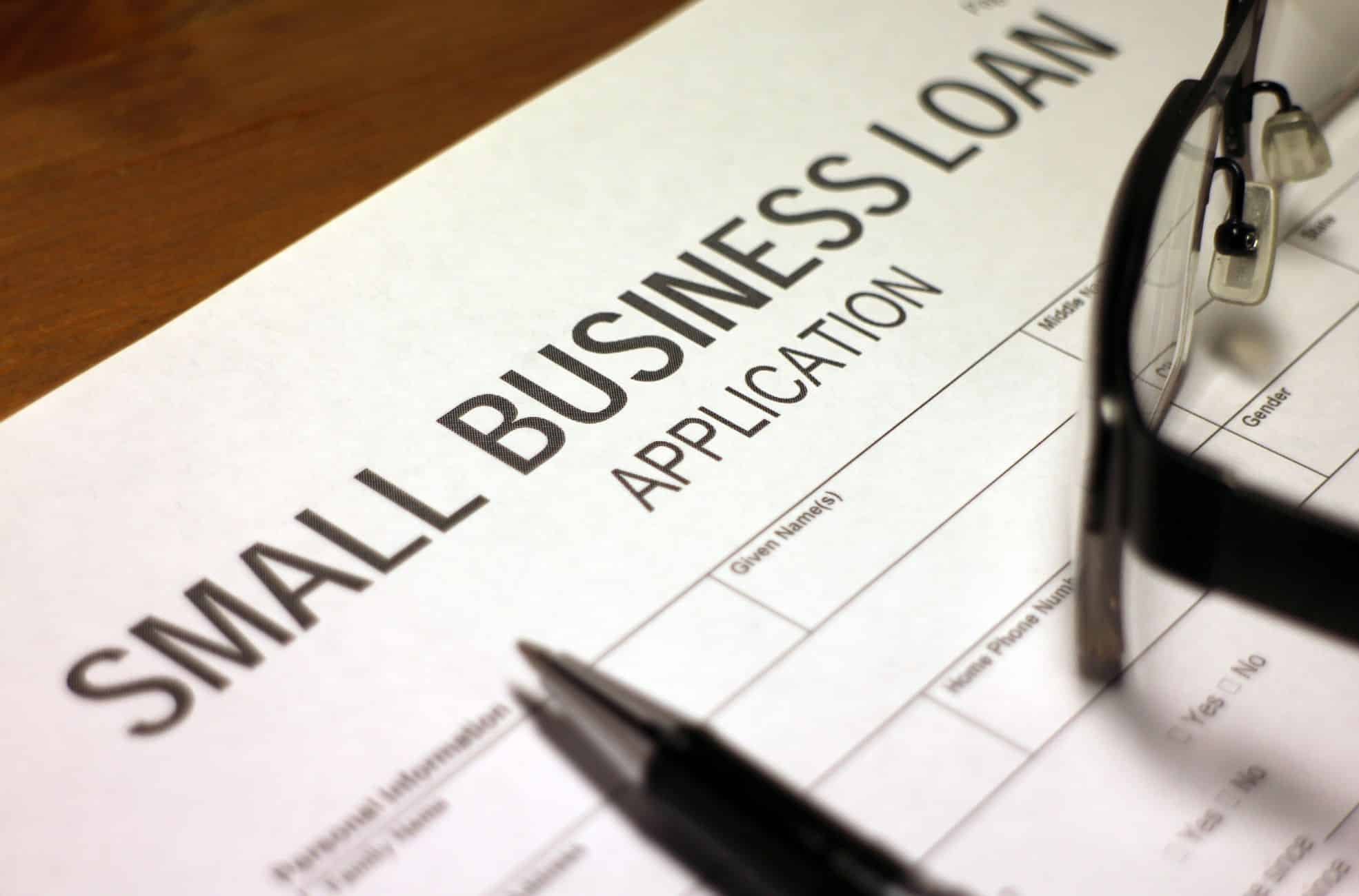Business Loan Form And Pen