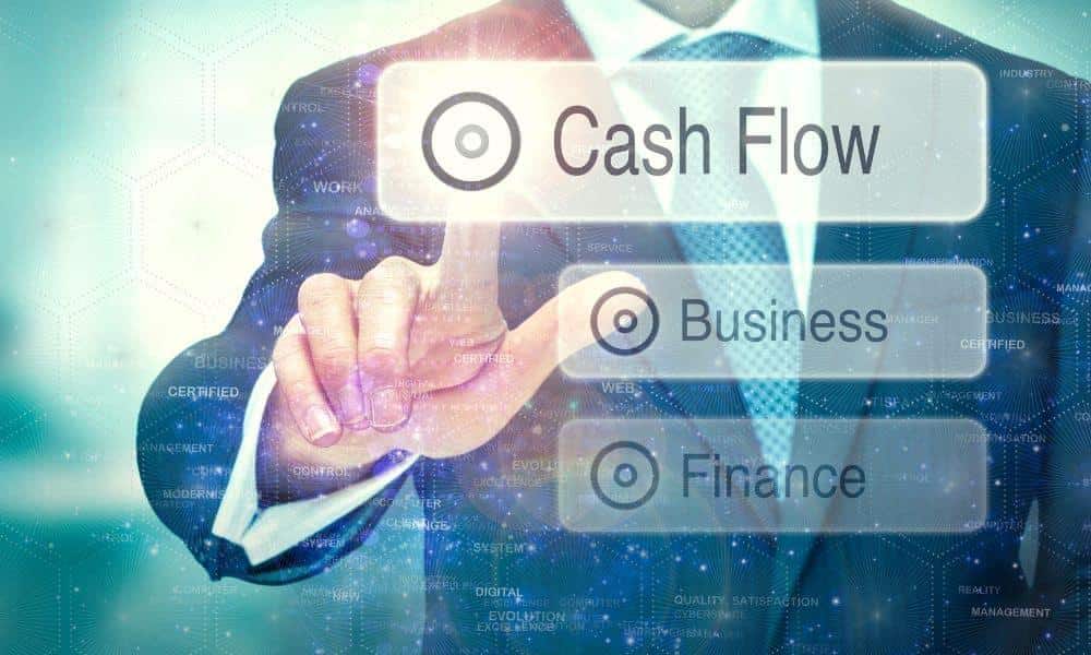 Business Man Pointing To Cash Flow Diagram