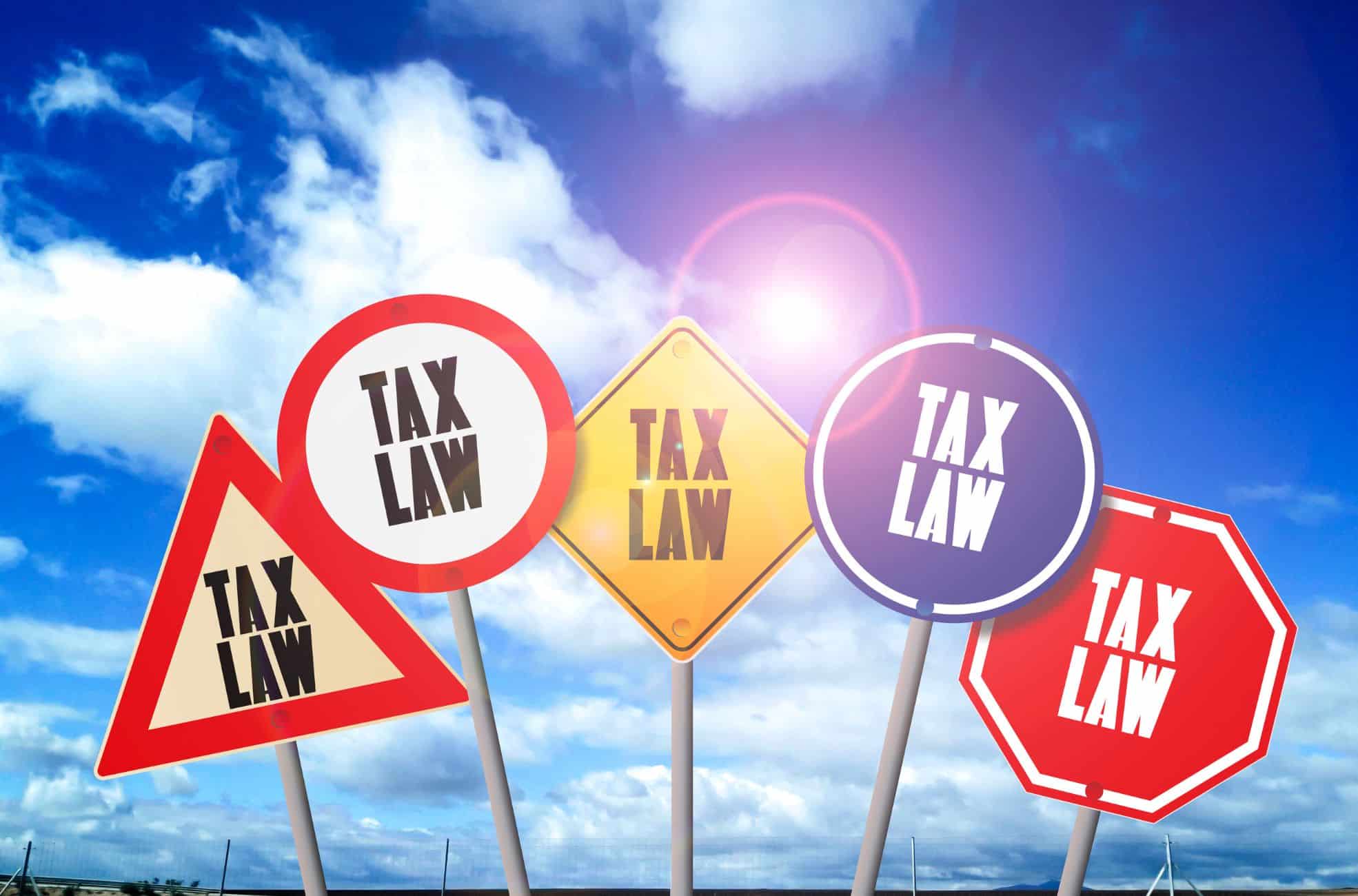 Stock Photo Of Tax Planning Law Written On Road Signs