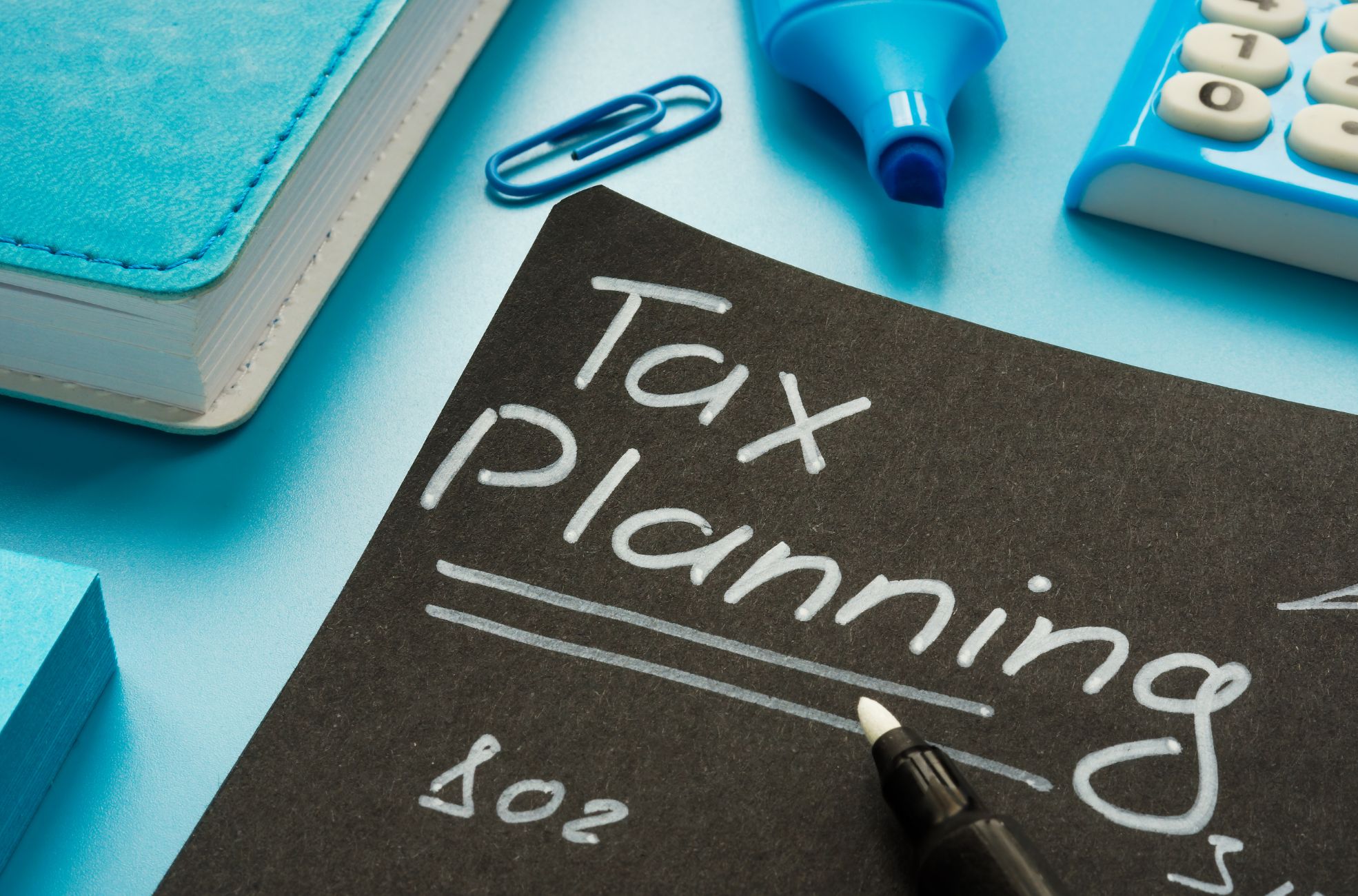Stock Photo Chalk Writing Of "Tax Planning"