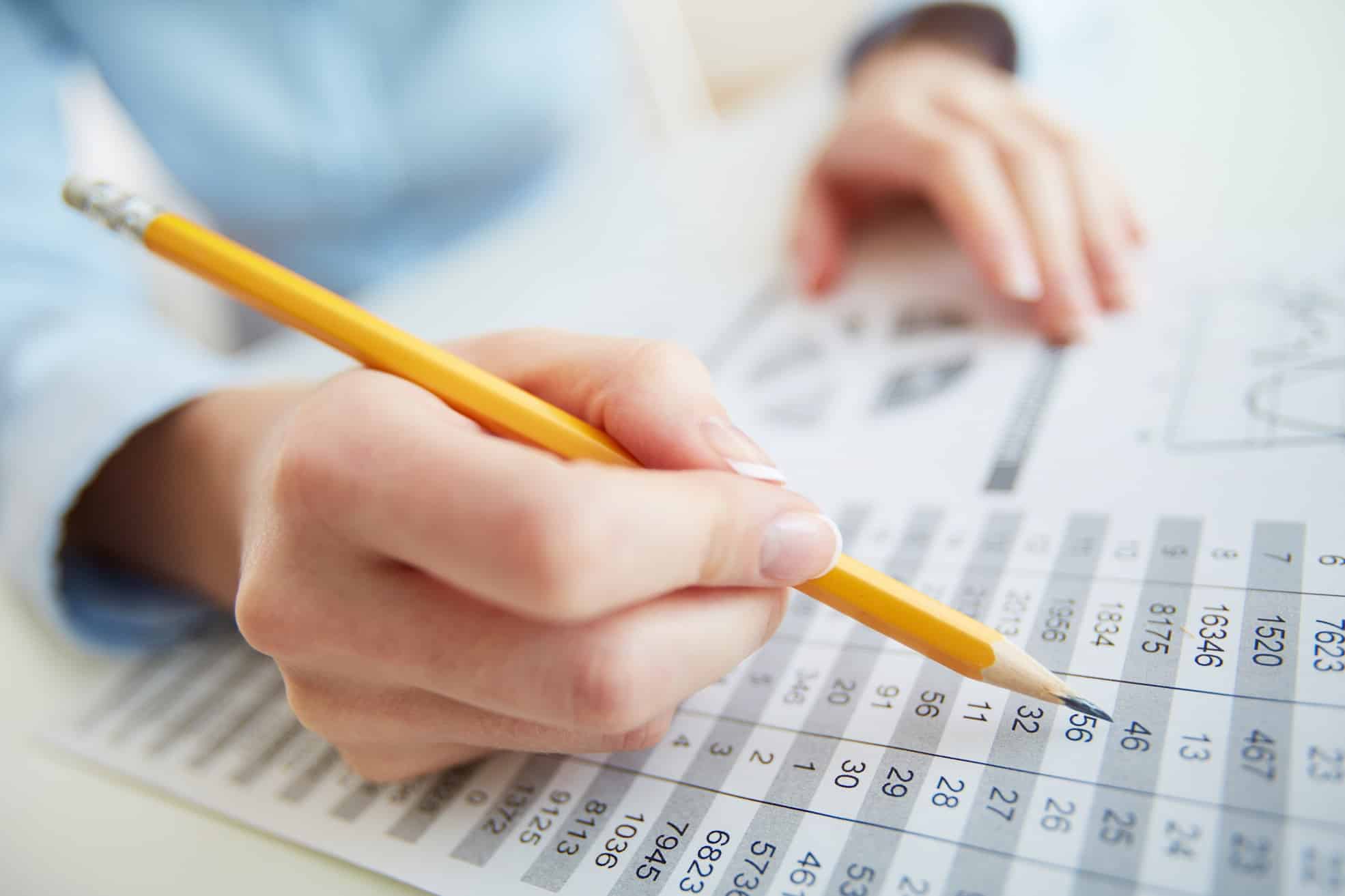An image of an accountant showing the use of the golden rules of accounting.