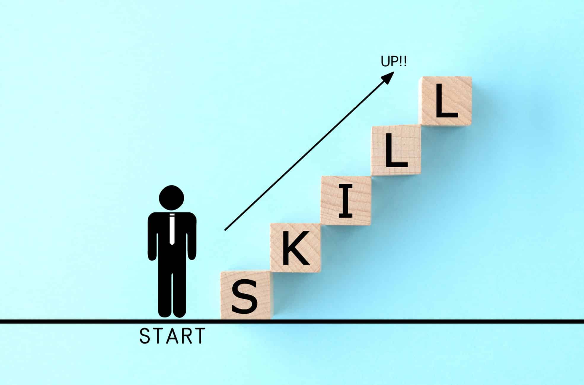 Building Blocks Saying SKILL With Stick Figure And Arrow