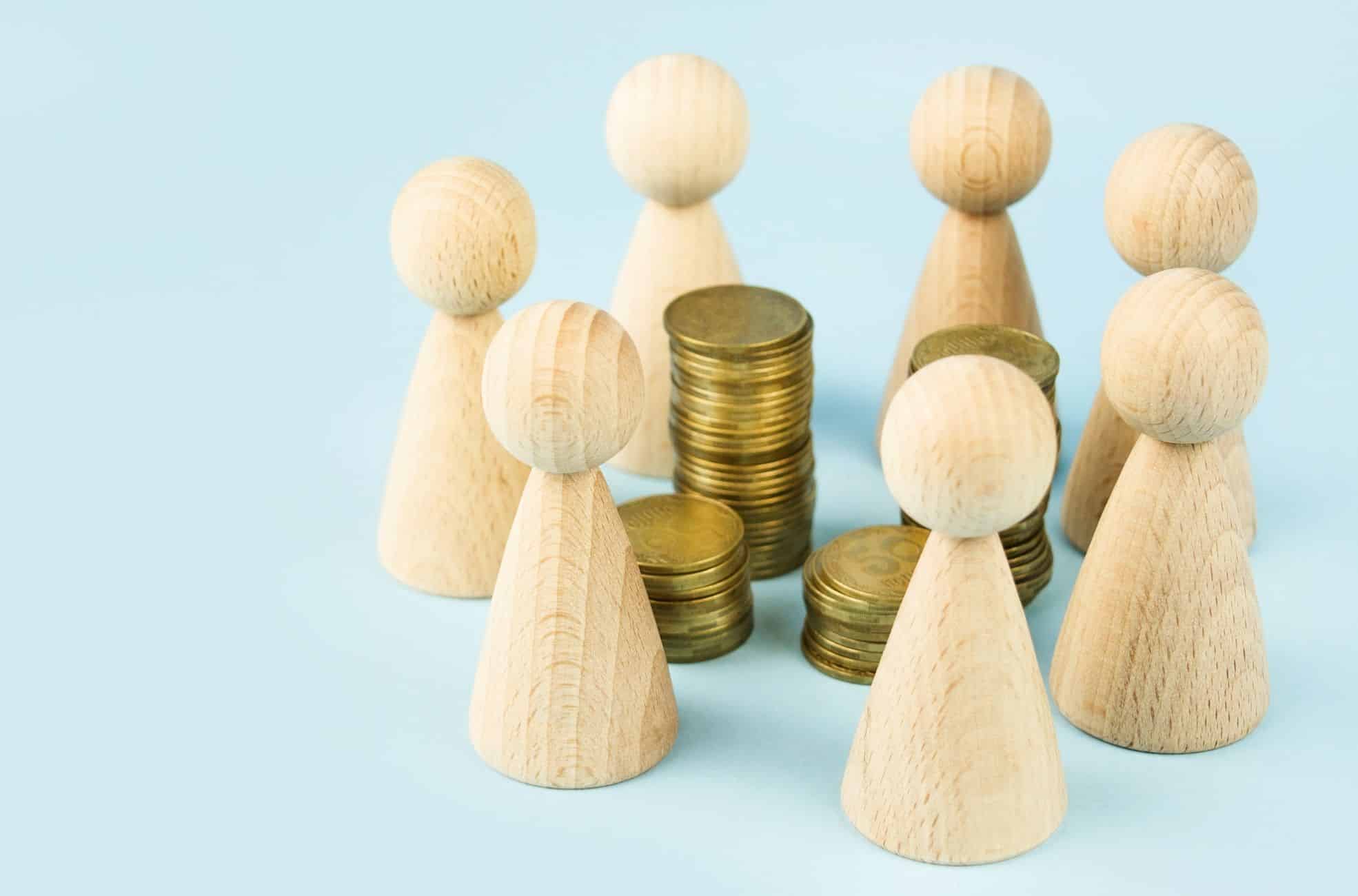 Wooden Dolls And Coin Tender