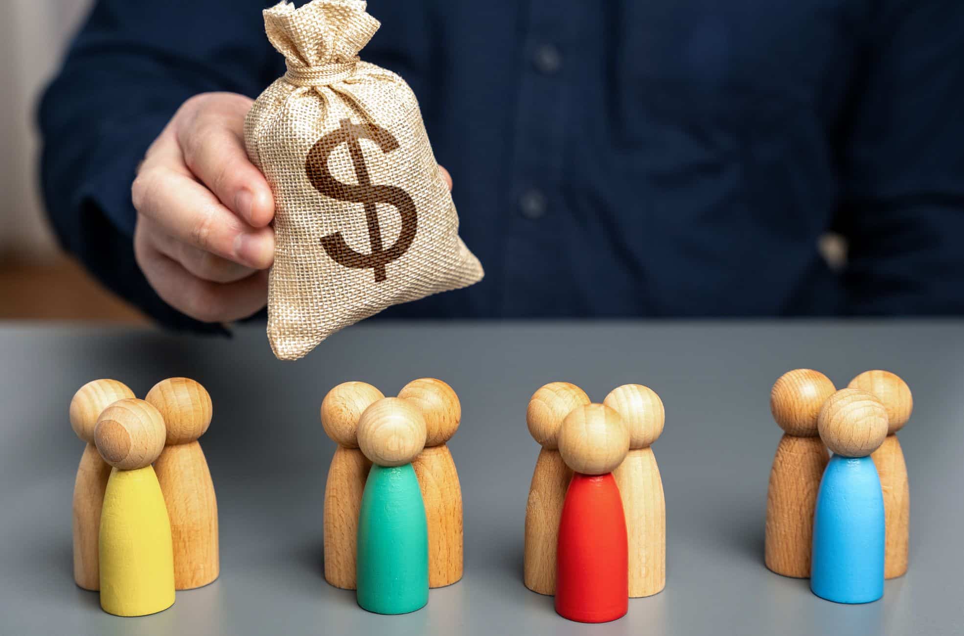 Wooden Dolls And Bag Of Tender