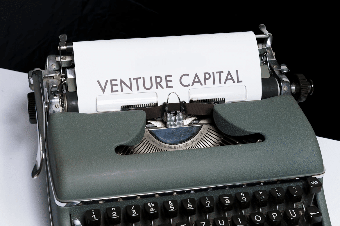 an image of a typewriter printing the words venture capital
